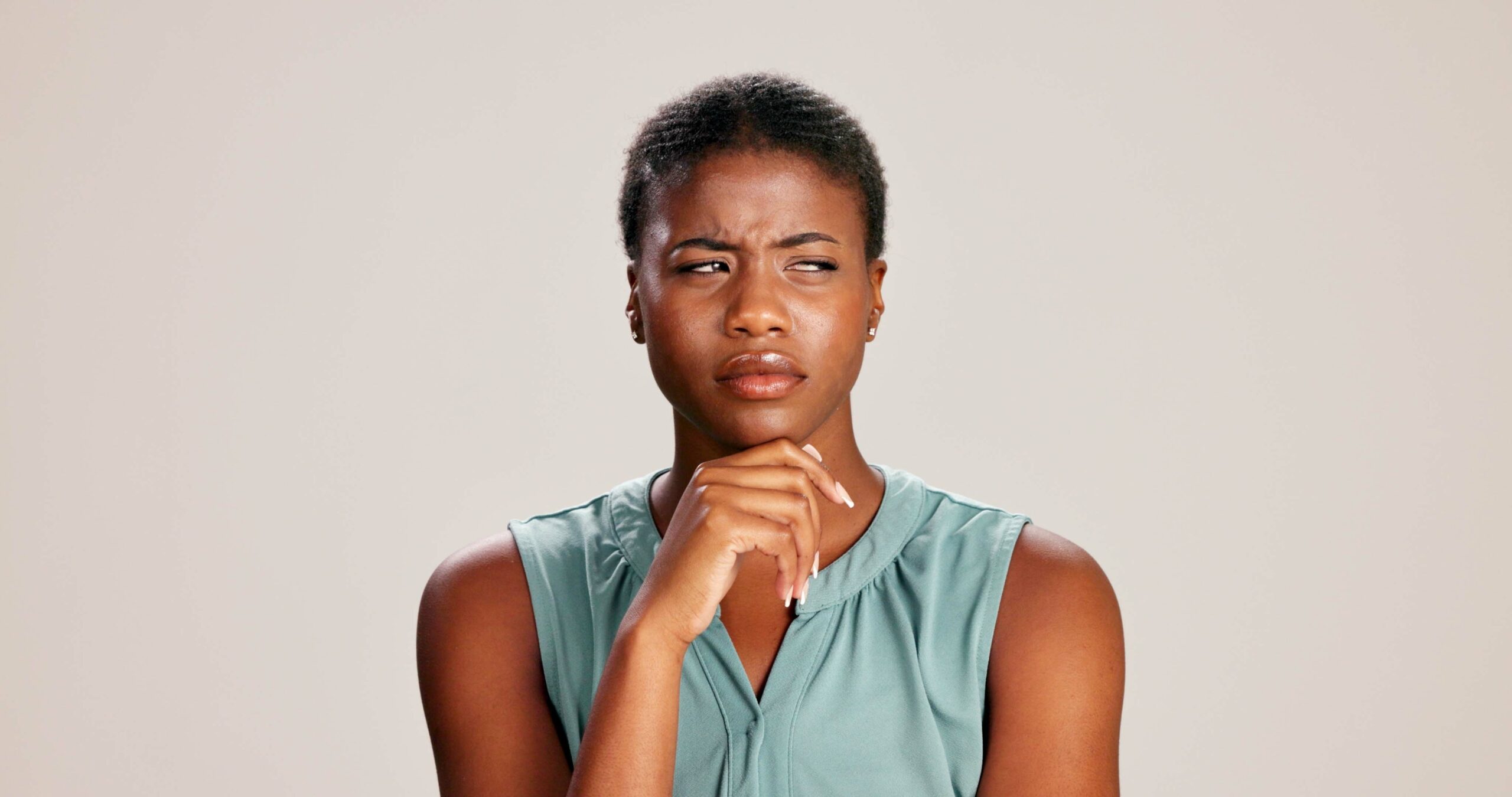 Black woman, doubt or thinking in studio for fashion, decision or education scam at mockup space. Design academic, suspicious or choice on white background for casual style, scholarship deal or query